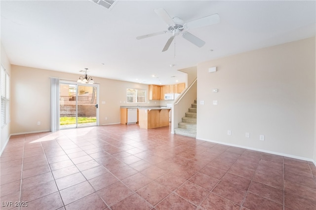 unfurnished living room with light tile patterned floors, visible vents, baseboards, stairway, and ceiling fan with notable chandelier