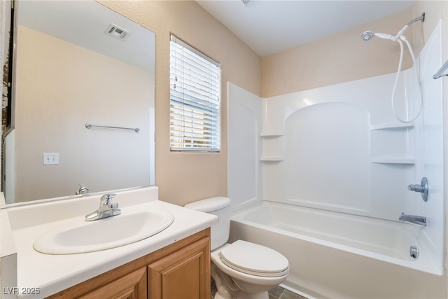 bathroom featuring bathtub / shower combination, visible vents, vanity, and toilet