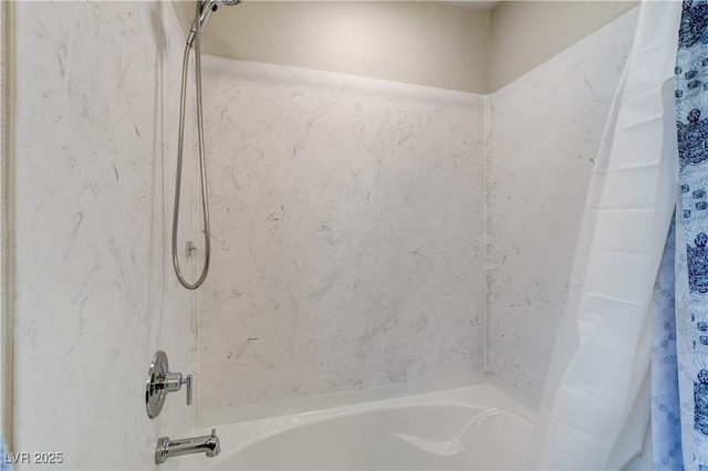 full bath with shower / bath combination with curtain