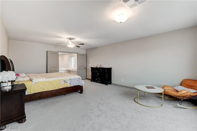 bedroom featuring ceiling fan, carpet flooring, visible vents, and baseboards