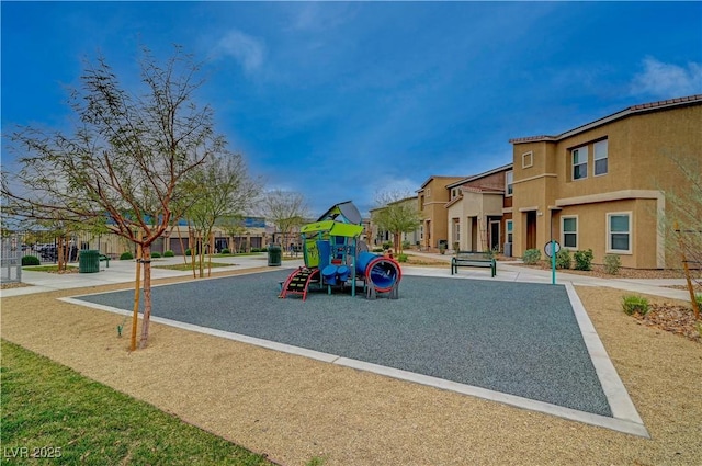 community playground featuring a residential view