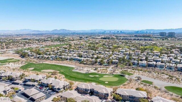 drone / aerial view featuring a mountain view and golf course view