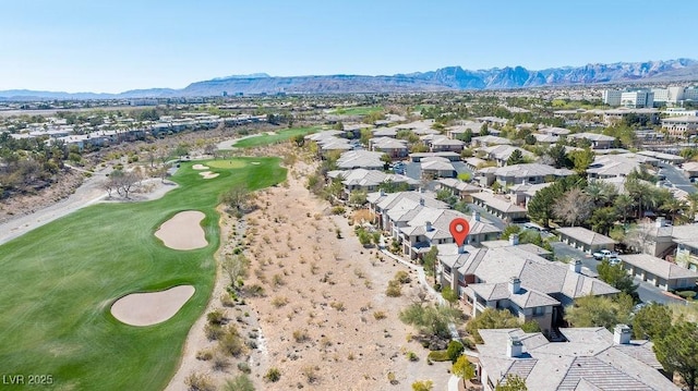 aerial view featuring a mountain view, a residential view, and view of golf course