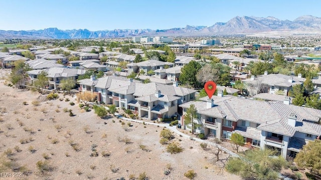 aerial view featuring a mountain view and a residential view