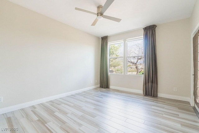 unfurnished room featuring light wood-style flooring, baseboards, and ceiling fan