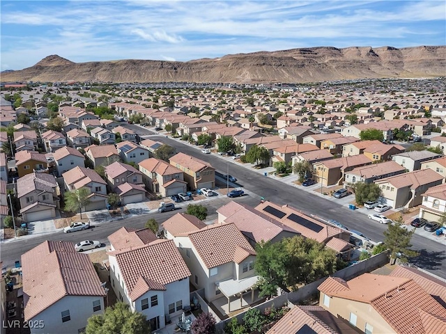 bird's eye view featuring a residential view and a mountain view