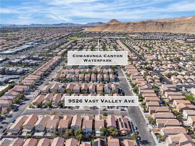 bird's eye view with a mountain view and a residential view