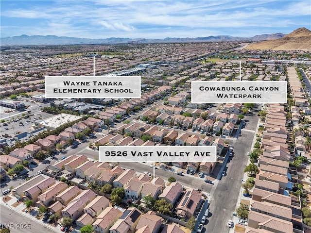 bird's eye view with a residential view and a mountain view