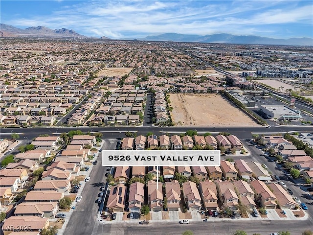 bird's eye view featuring a residential view and a mountain view