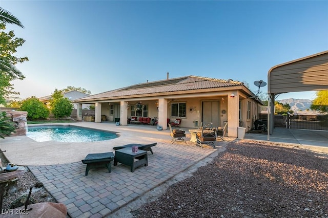 view of swimming pool featuring a patio area and a fenced in pool