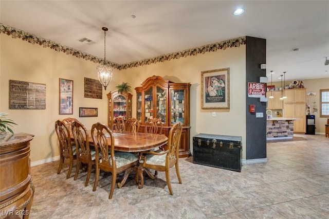 dining room with light tile patterned floors, recessed lighting, a notable chandelier, visible vents, and baseboards