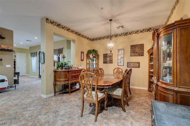 dining area featuring a chandelier, recessed lighting, visible vents, and baseboards