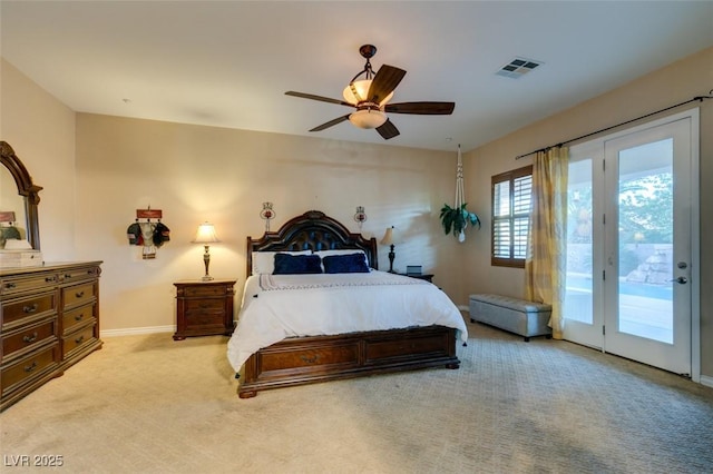 carpeted bedroom with access to exterior, baseboards, visible vents, and a ceiling fan