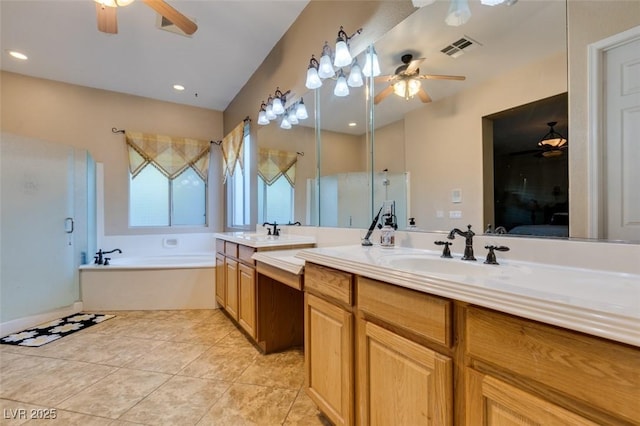 full bath featuring a ceiling fan, visible vents, and a sink