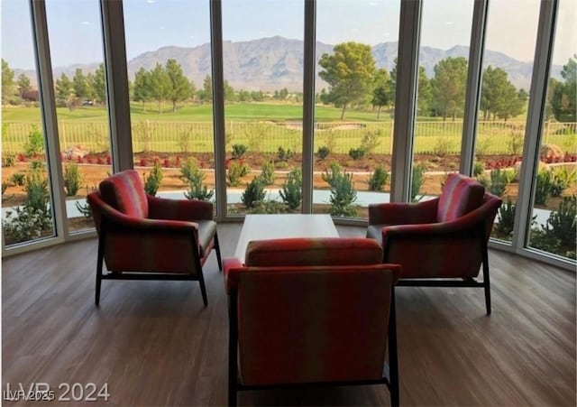 sunroom with a mountain view