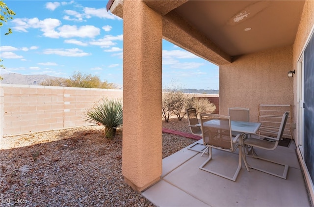 view of patio / terrace with fence and outdoor dining space