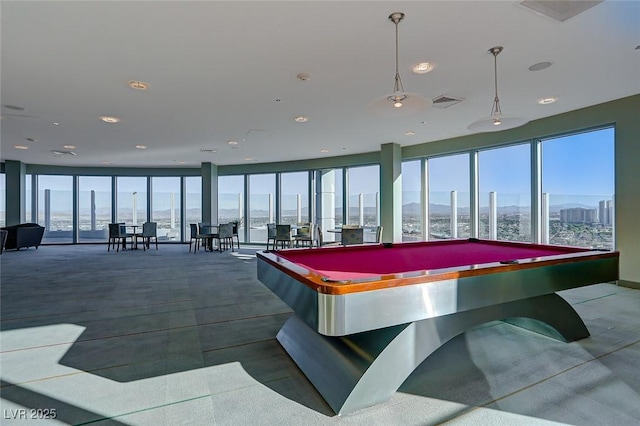 recreation room with a view of city, visible vents, and pool table