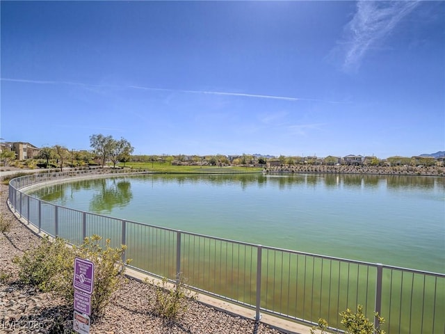 view of water feature featuring fence