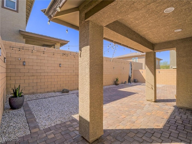 view of patio with a fenced backyard