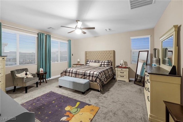 bedroom with light carpet and visible vents