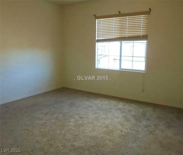 unfurnished room featuring carpet floors