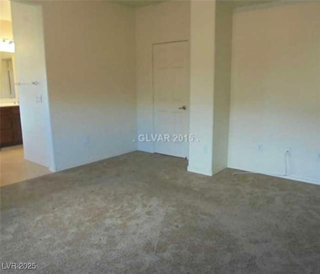 unfurnished bedroom with carpet flooring