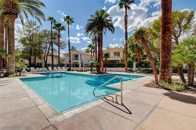 community pool with a patio