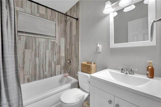 full bath featuring shower / bath combination with curtain, a textured wall, vanity, and toilet