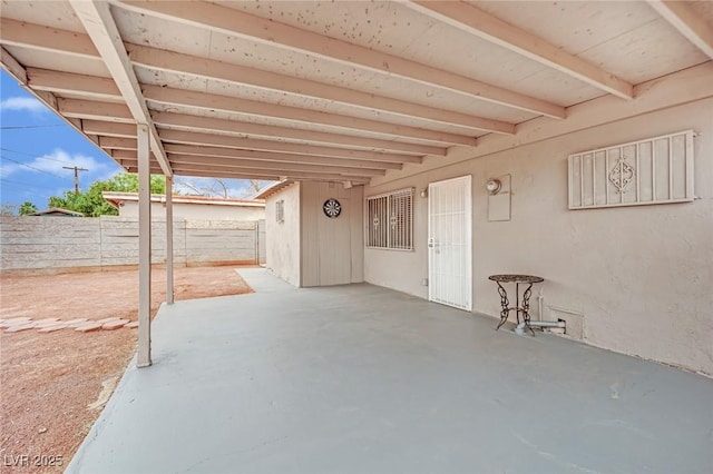 view of patio with fence