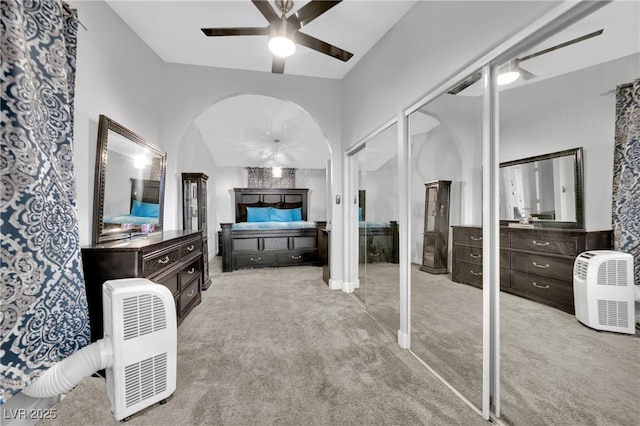 bathroom featuring carpet, connected bathroom, and a ceiling fan