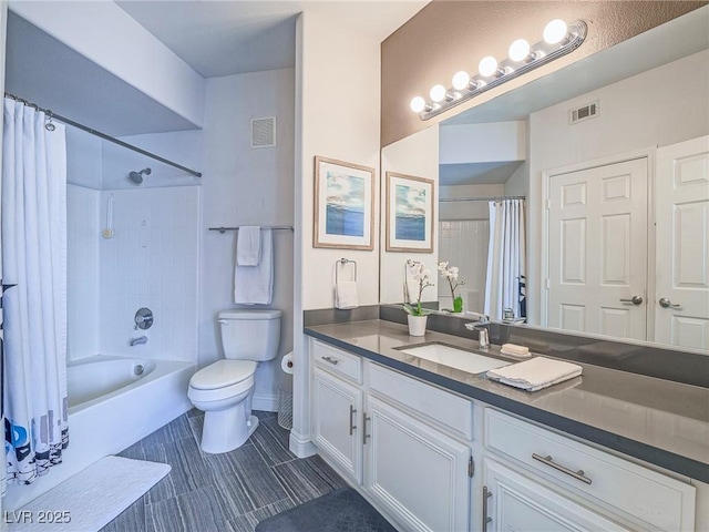 bathroom featuring toilet, shower / bath combination with curtain, vanity, and visible vents