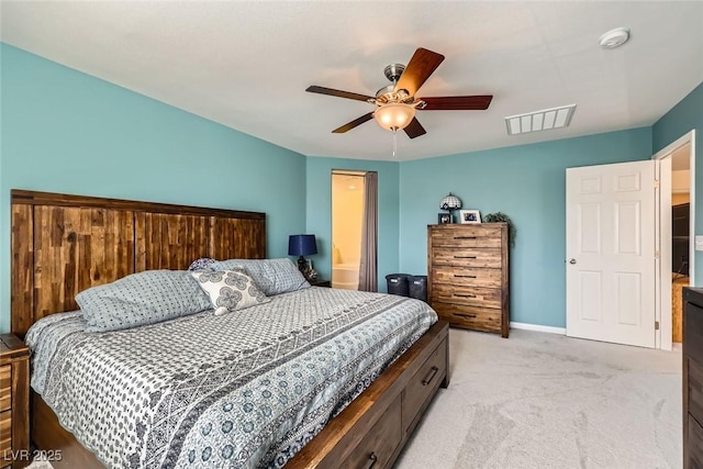 bedroom with baseboards, a ceiling fan, visible vents, and light colored carpet