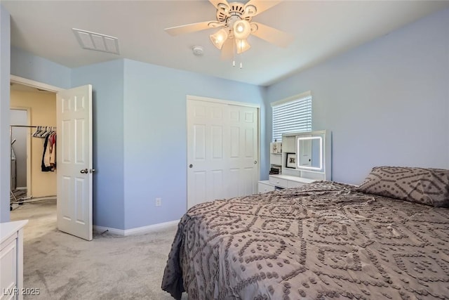 bedroom with visible vents, ceiling fan, light carpet, and baseboards