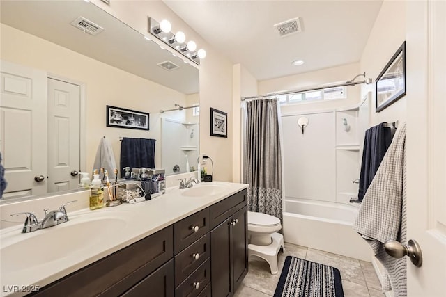 full bathroom featuring toilet, a sink, and visible vents