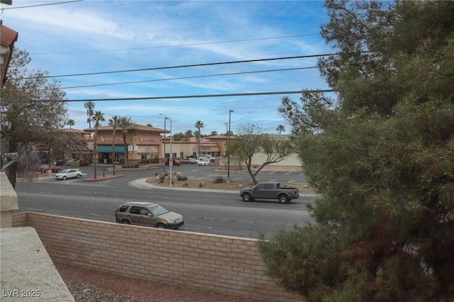 view of road with street lights and sidewalks