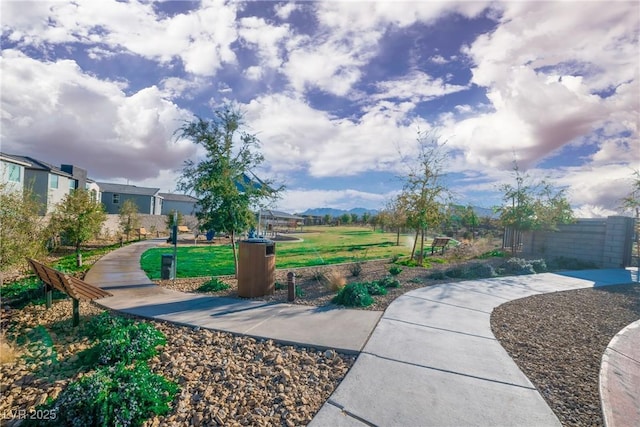 10009 Locking Biner Ave, Las Vegas, NV 89166 - surrounding community with a lawn