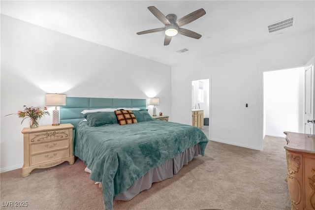 bedroom featuring light carpet, visible vents, and baseboards