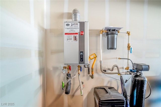 utility room with tankless water heater