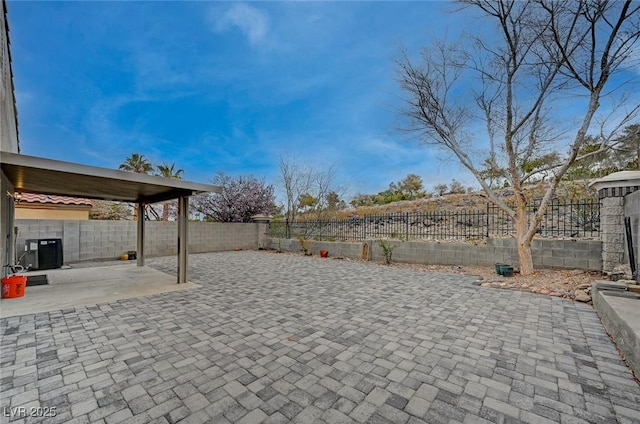 view of patio / terrace featuring central AC and a fenced backyard