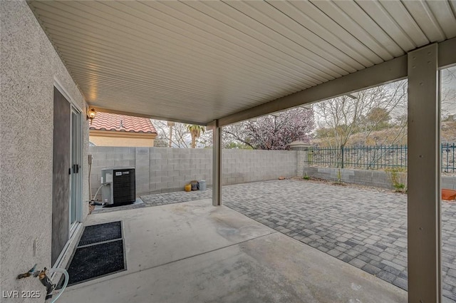 view of patio featuring central air condition unit and a fenced backyard