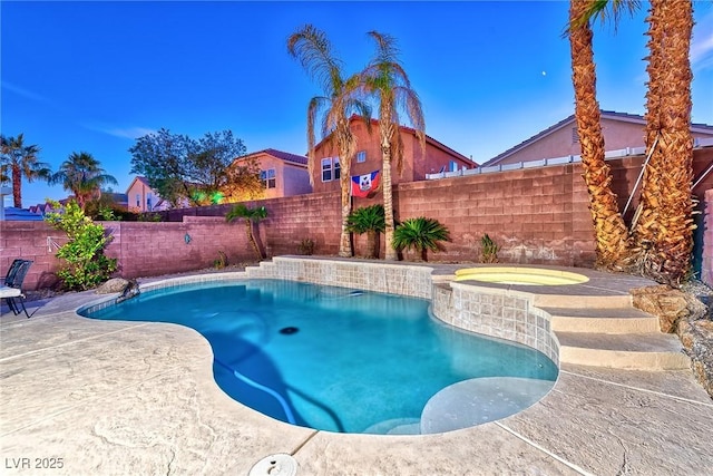 view of pool with a fenced in pool, a fenced backyard, a patio, and an in ground hot tub