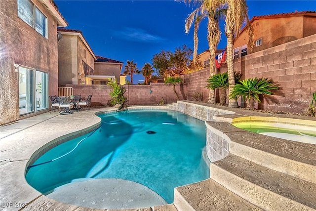 view of swimming pool with a patio, a fenced backyard, a fenced in pool, and an in ground hot tub