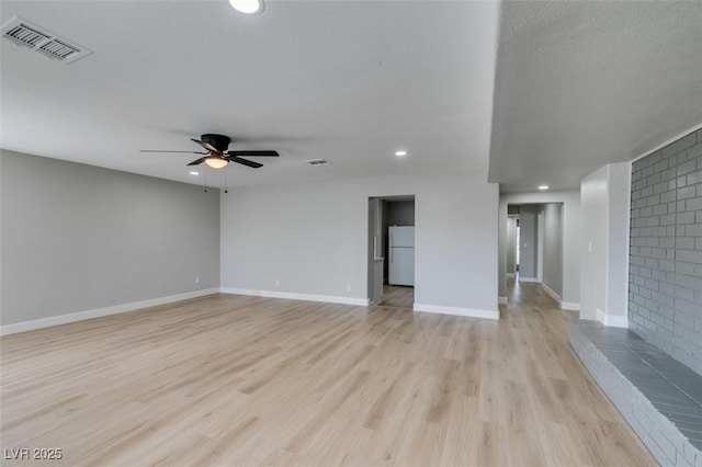 unfurnished room featuring visible vents, light wood-style flooring, recessed lighting, baseboards, and ceiling fan