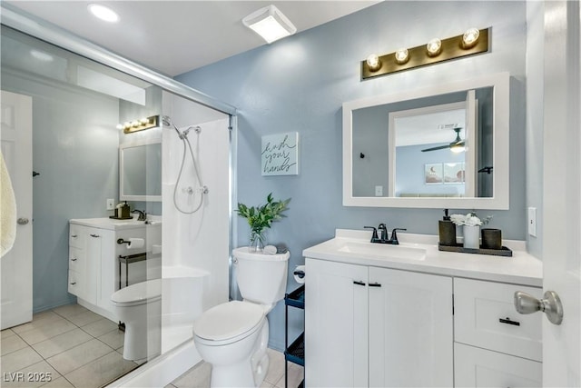 full bath with vanity, a shower, tile patterned flooring, and toilet