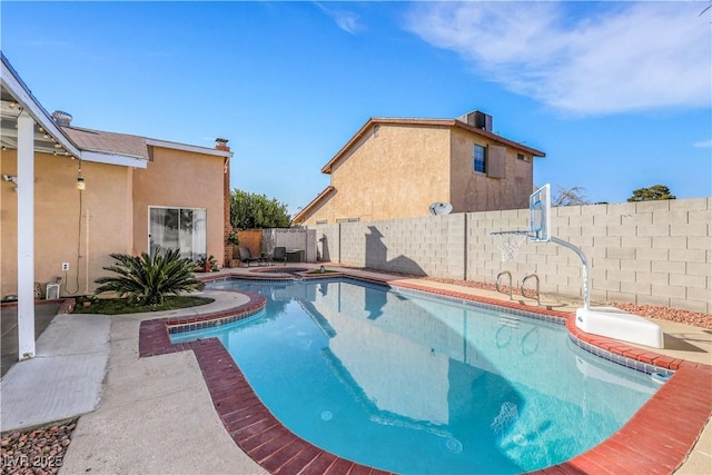 view of pool featuring a fenced in pool, a patio, an in ground hot tub, cooling unit, and a fenced backyard