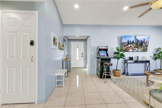 foyer entrance with recessed lighting, ceiling fan, and light tile patterned floors