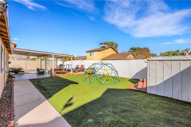 view of yard featuring a patio and a fenced backyard