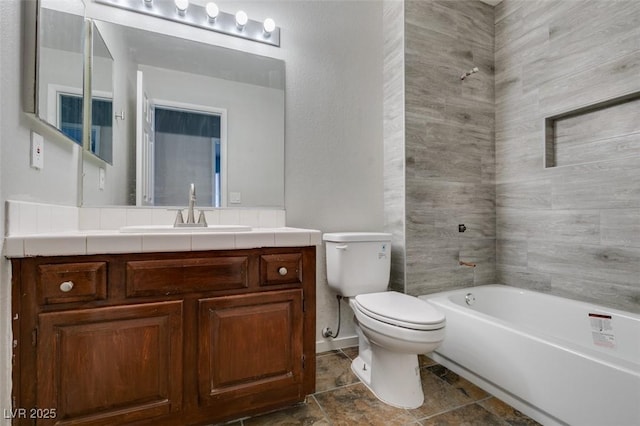 full bathroom featuring shower / bath combination, vanity, and toilet