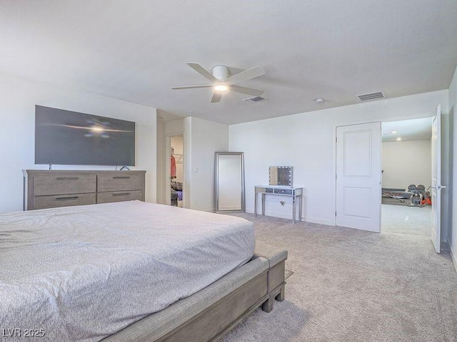 bedroom featuring a ceiling fan, visible vents, carpet floors, and baseboards