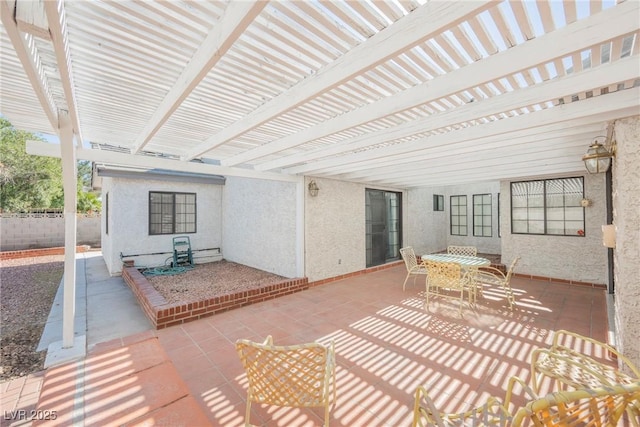 view of patio / terrace featuring outdoor dining area, fence, and a pergola